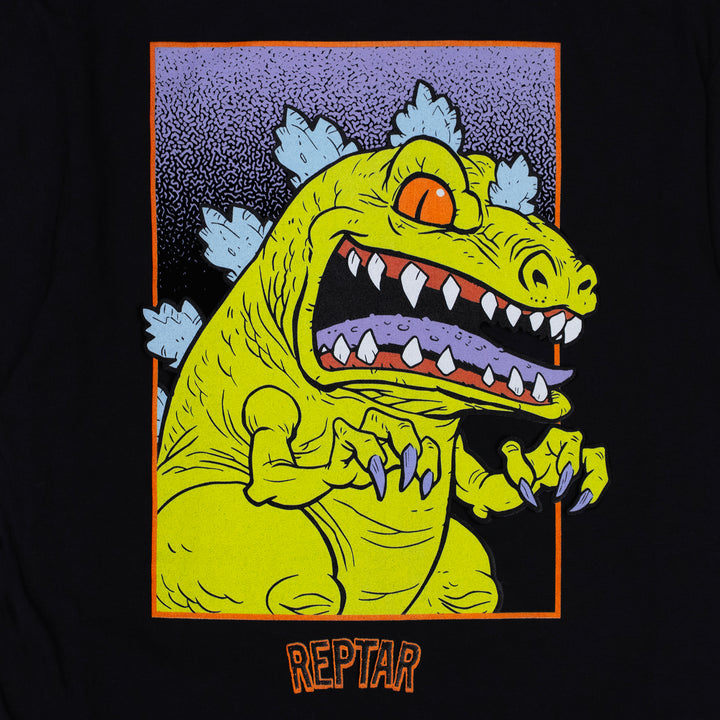 james groman reptar black tee close up of back of shirt. image: reptar dinosaur with claws ready. inside rectangle. text: reptar