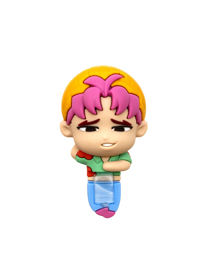 A small chibi-style character figure with yellow hair, pink hair, a green shirt, red shorts, and blue pants, shown against a plain white background.