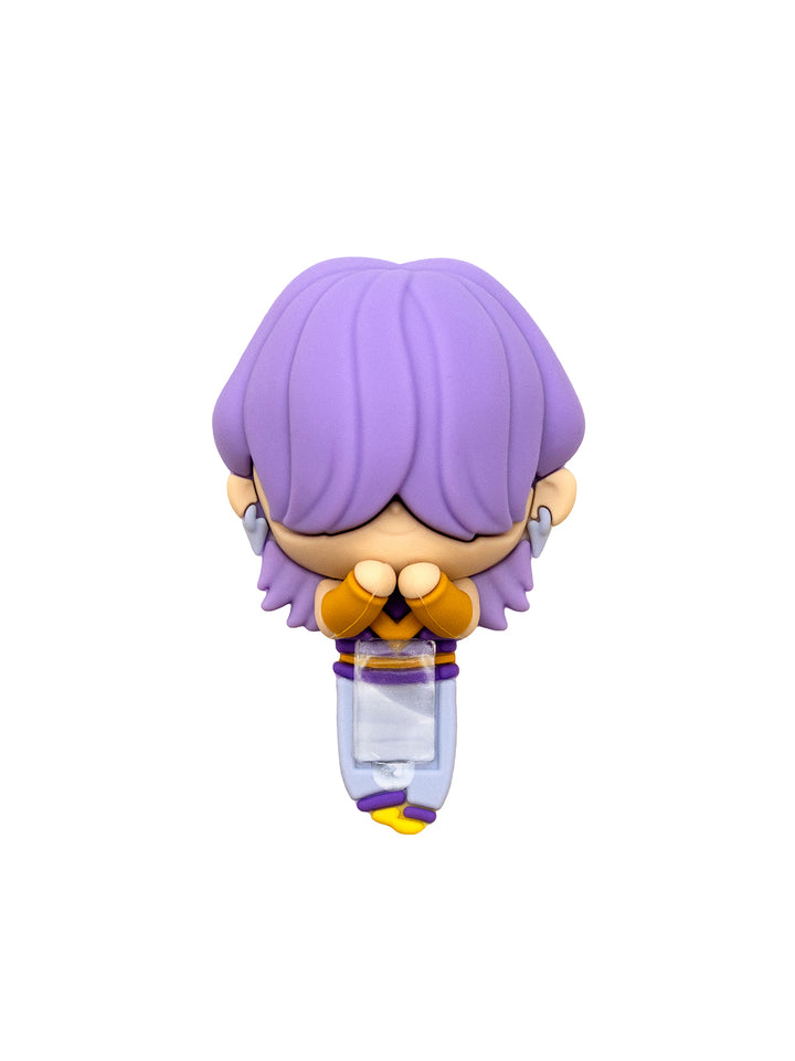 A chibi-style collectible figure with short lavender-purple hair, wearing a yellow and purple outfit, shown against a plain white background.