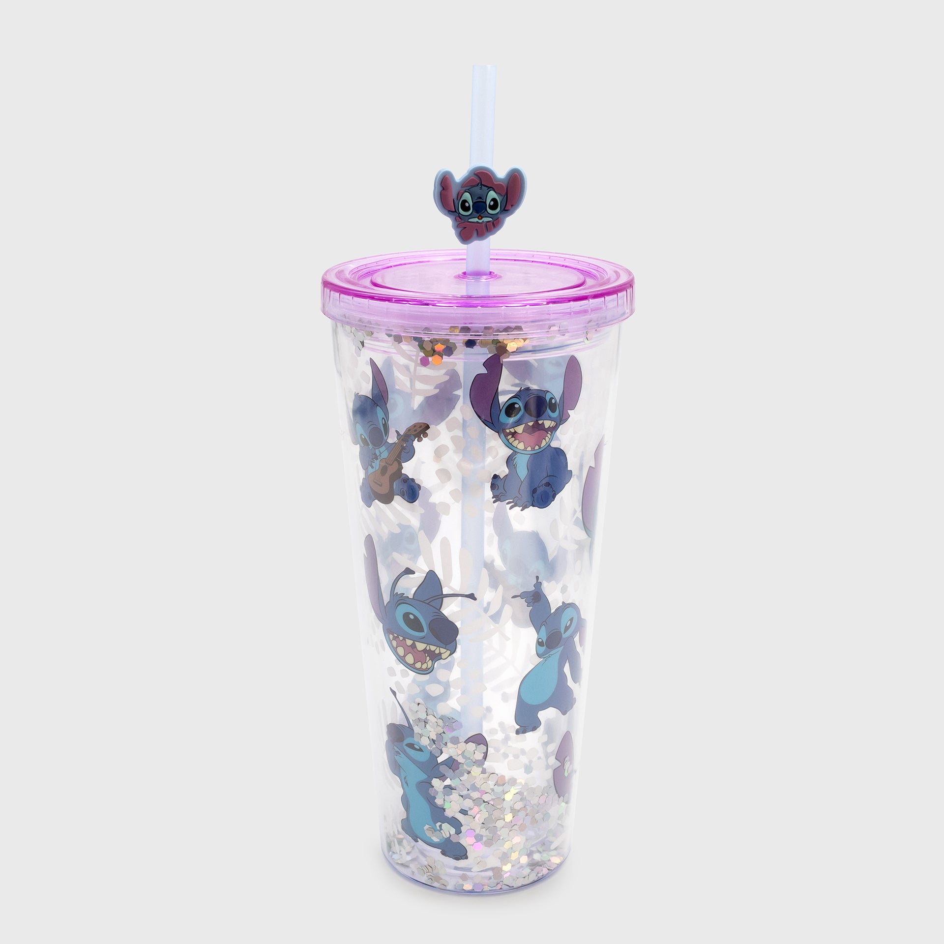 tumbler. image: stitch in different poses. stitch surprised on silicone topper. sparkles inside.