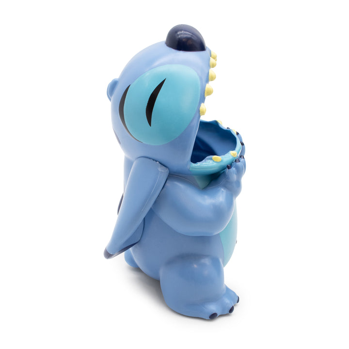 Blue cartoon character on a white background