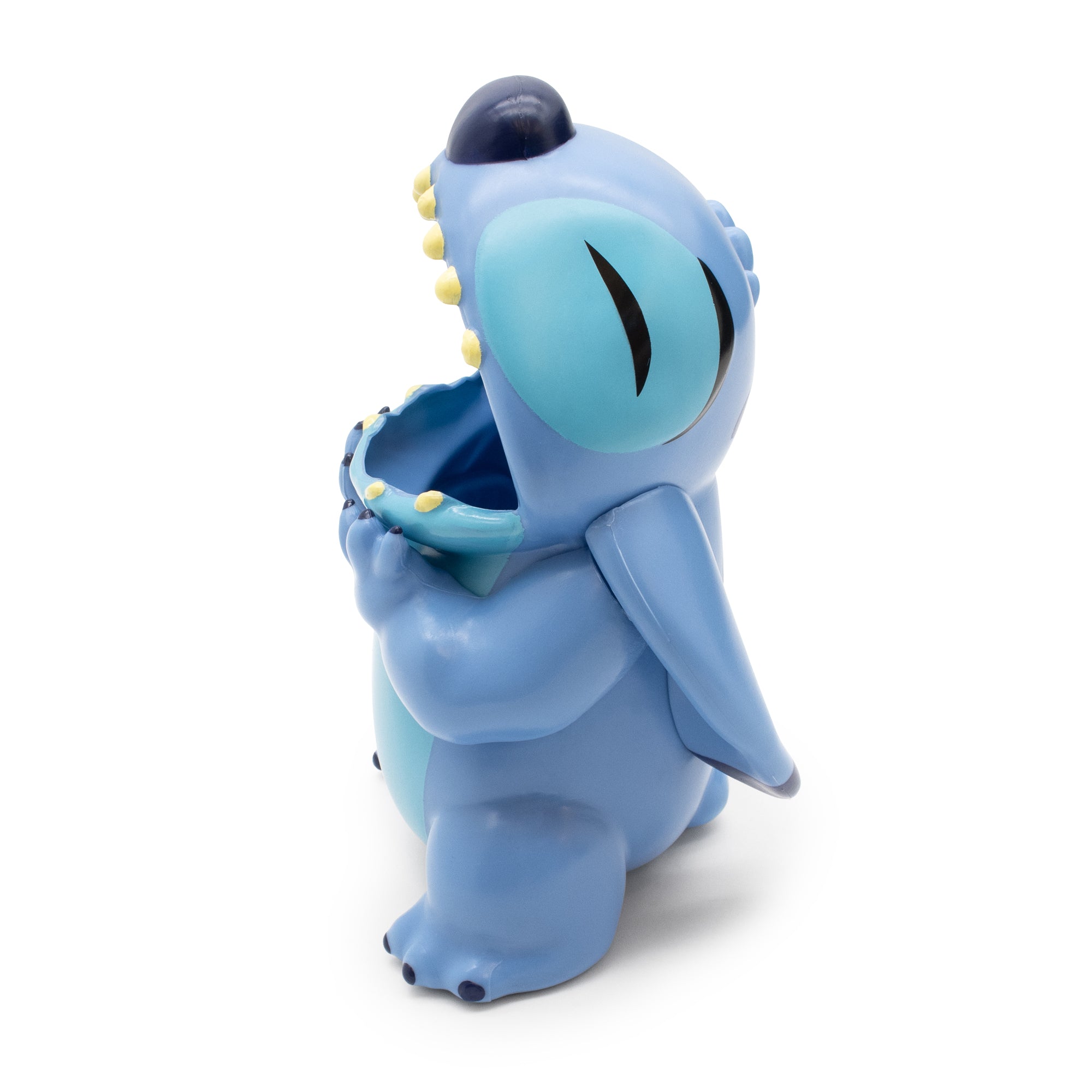 Blue cartoon character holding mouth open on a white background