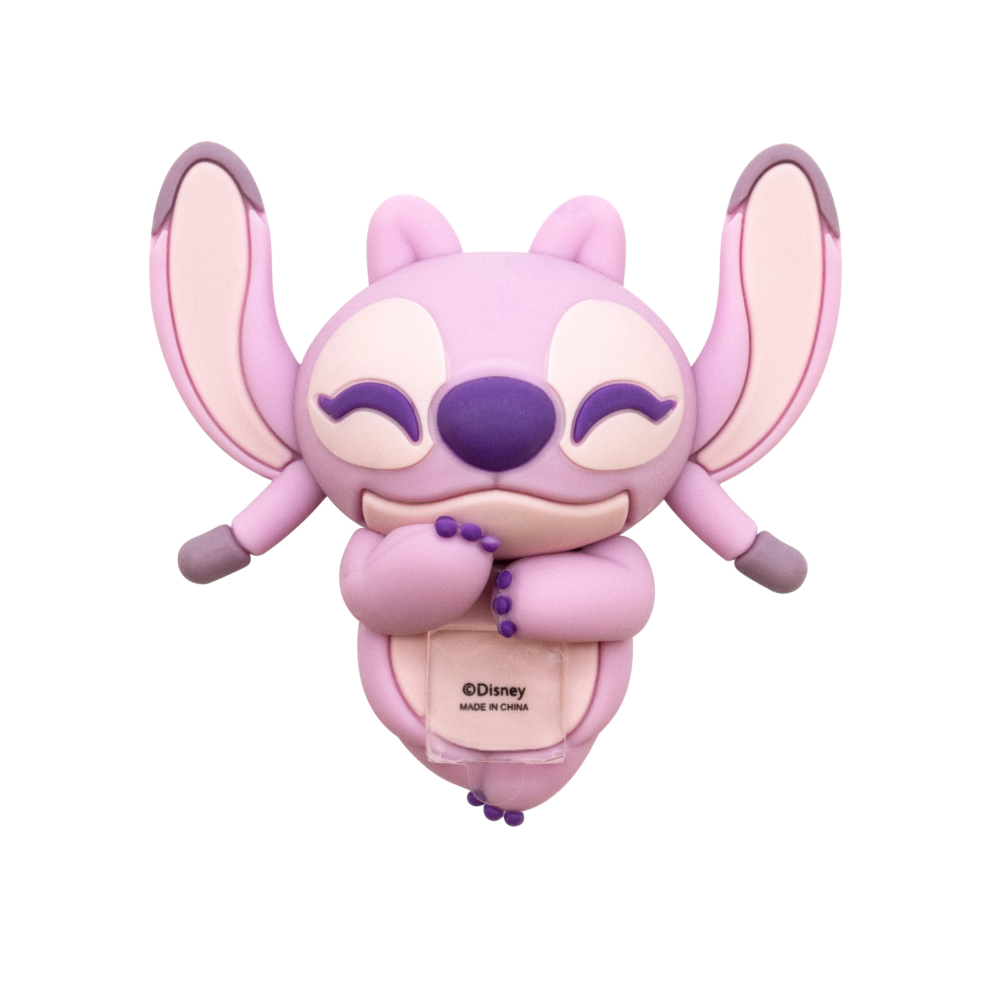 A pink and purple Angel Stitch character accessory, possibly a phone case, featuring a cute cartoon design with closed eyes, on a plain white background.