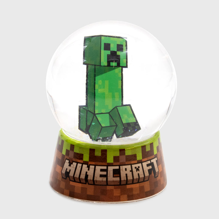 led snow globe. creeper inside of globe. stand is dirt grass. text: minecraft