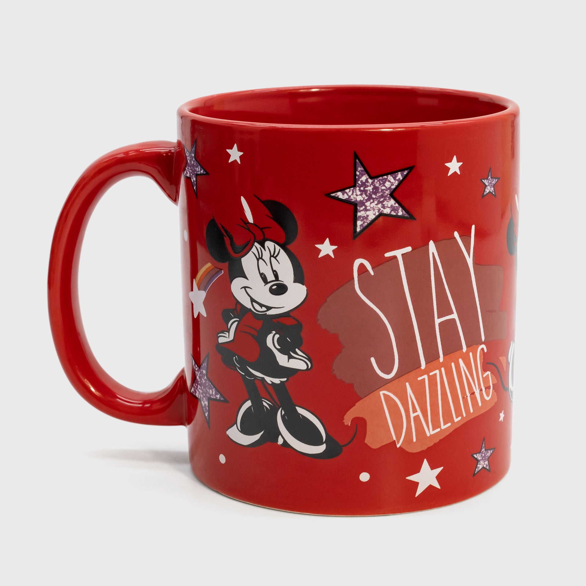 minnie mouse mug side 1. image: minnie mouse standing. stars, circles, and a shooting star. text: stay dazzling