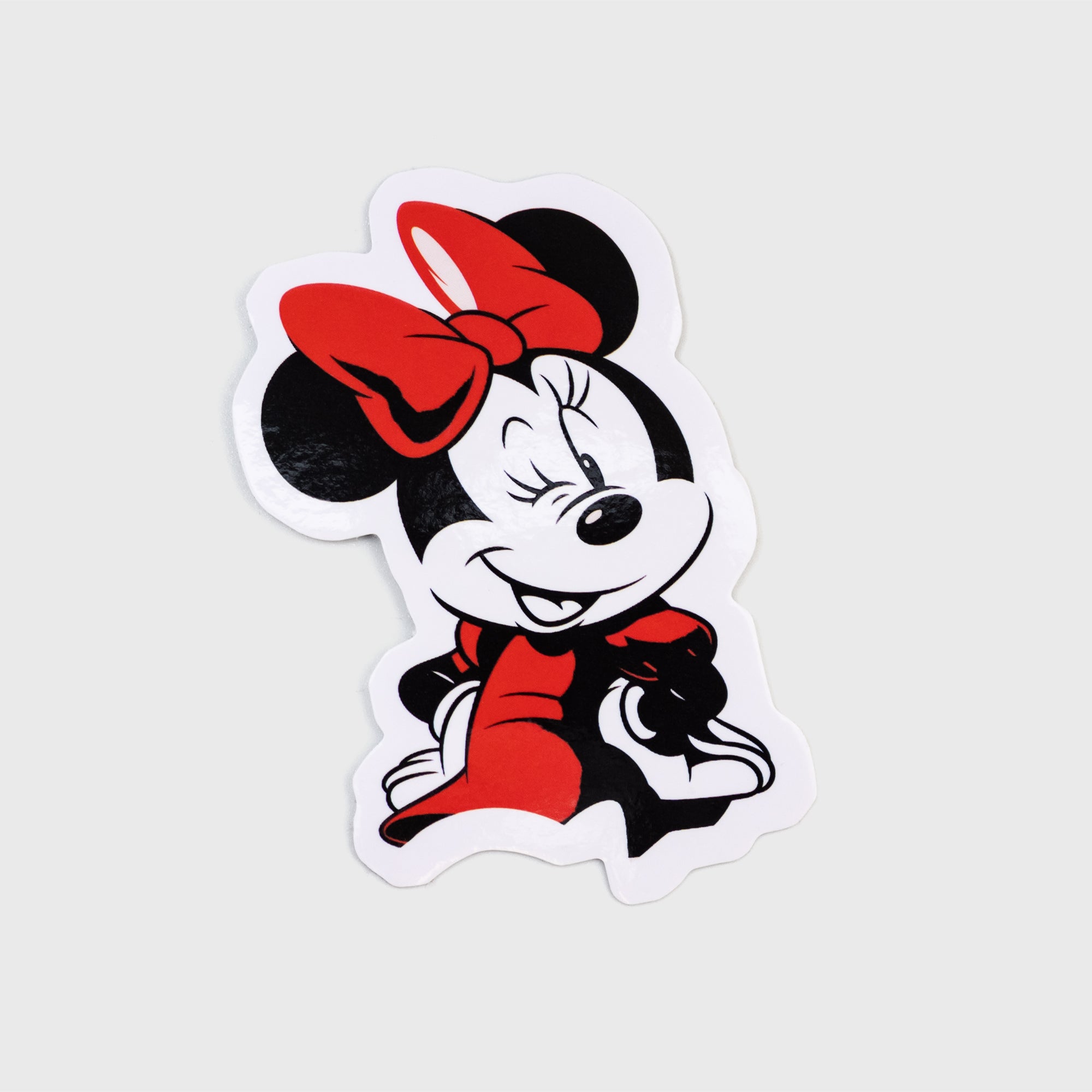 minnie mouse sticker. minnie winking and smiling.