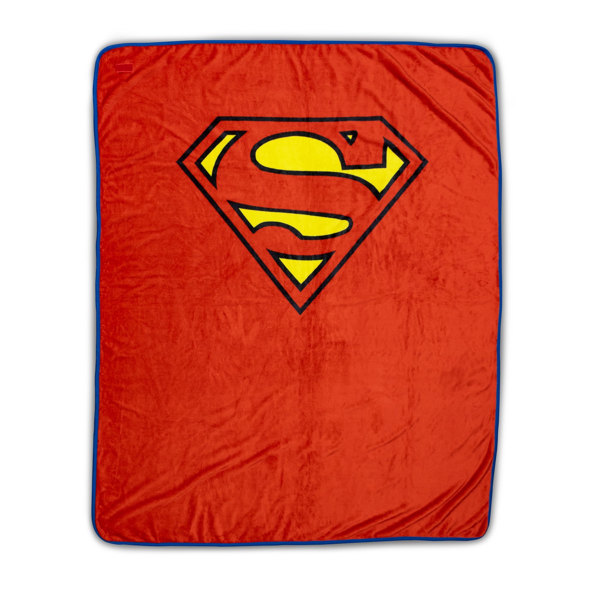 Red blanket with Superman logo on a white background