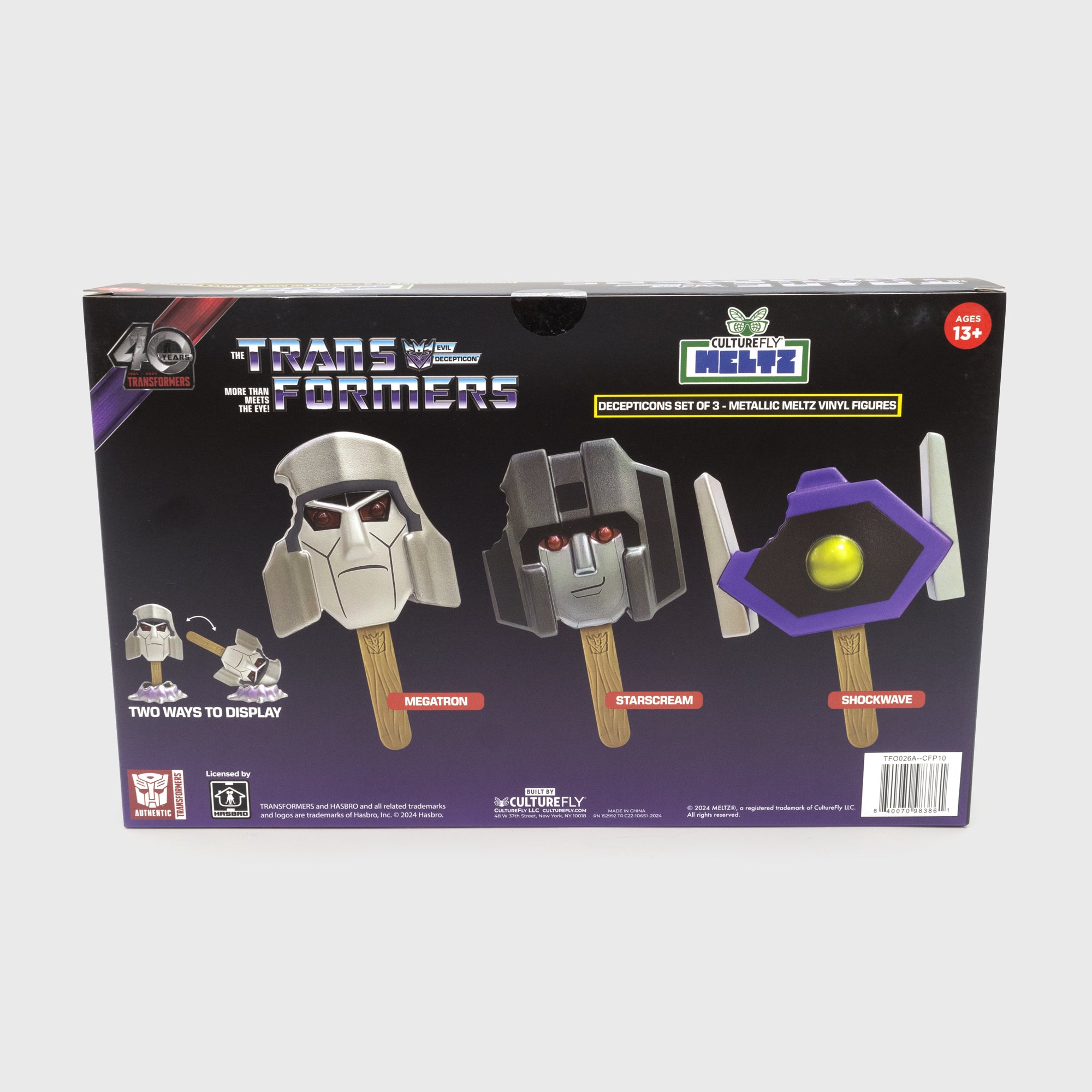 back of packaging. showing all 3 meltz. text: the transformers evil decepticon more than meets the eye! culturefly meltz. ages 13+. decepticons set of 3 - metallic meltz vinyl figures. two ways to display. megatron. starscream. shockwave.