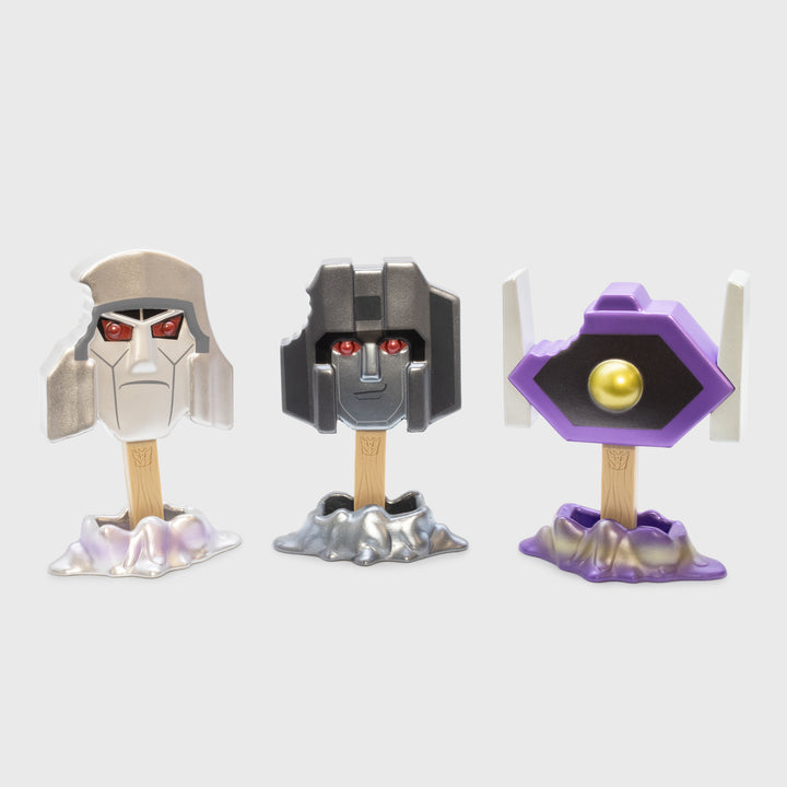 metallic transformers decepticons 3 set standing up on stands. megatron, starscream, shockwave