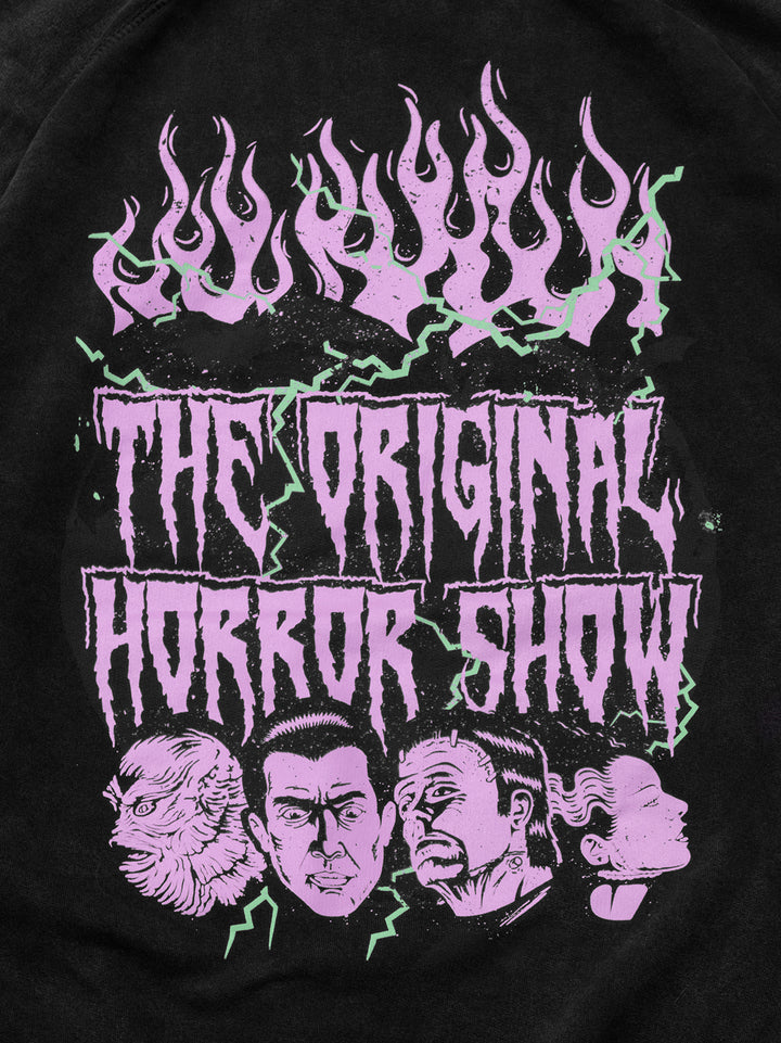 Close up of back. the original horror show. gillman head, dracula head, frankenstein head, bride of frankenstein head. flames and lighting design.