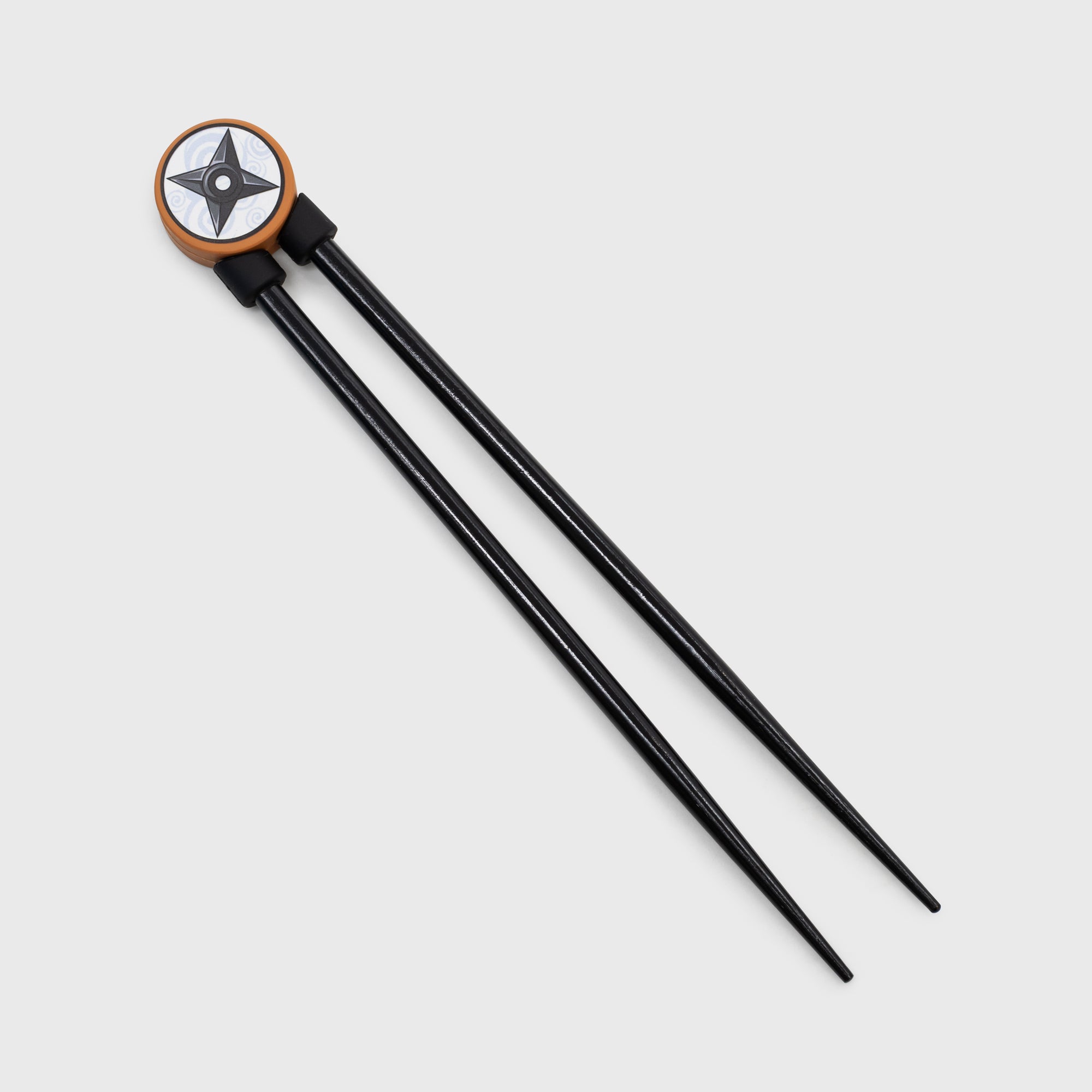 chopsticks. topper: shruiken