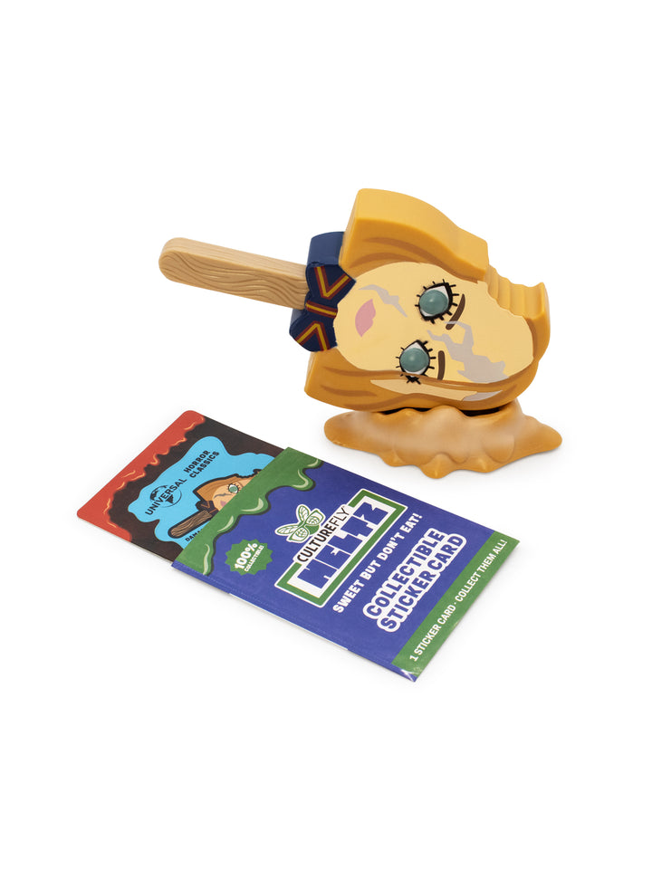 Toy figure of a character accompanied by a colorful card on a white background.