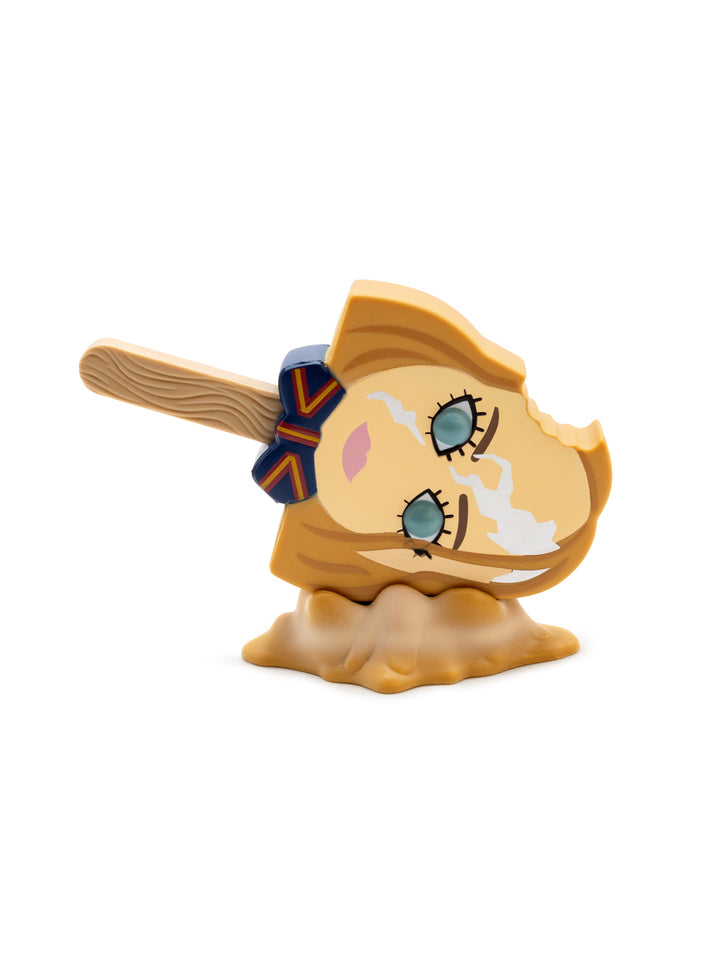 Toy figure with a face and hair on a white background