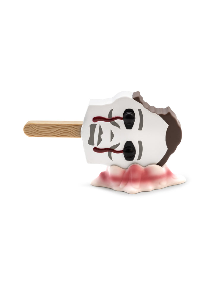 Toy figure with a face design on a white background
