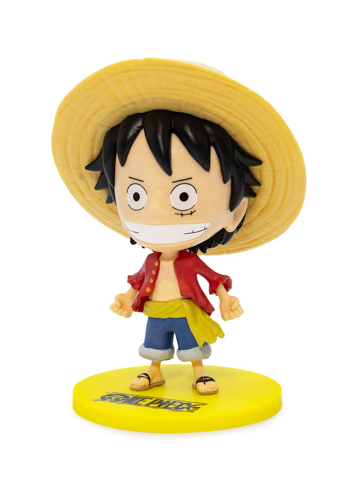 Figurine of a character with a yellow hat and red jacket on a white background