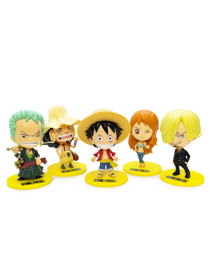 Set of five colorful figurines on yellow stands against a white background