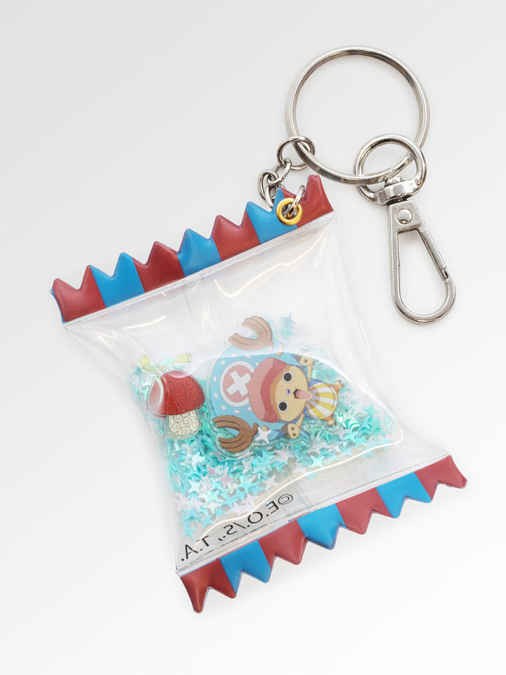 Keychain with a character design in a clear package on a white background