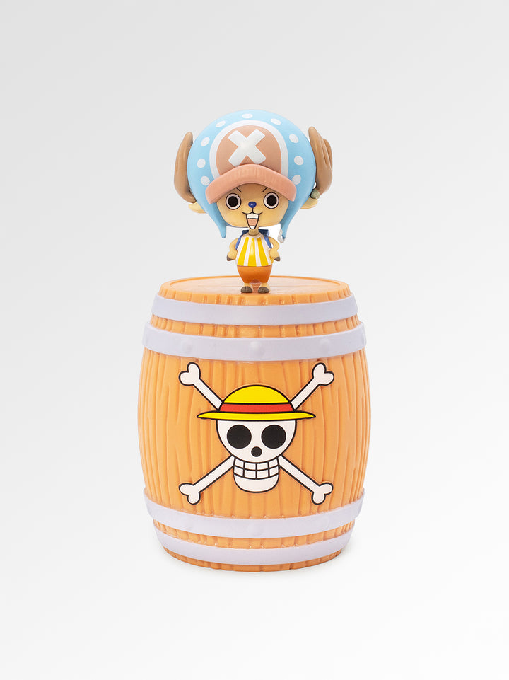 Toy figure on a barrel with character design, white background