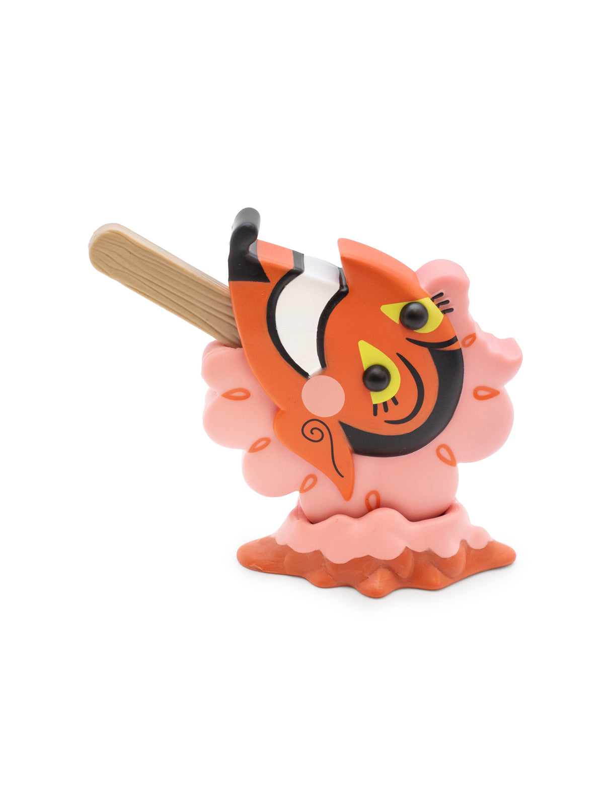 Toy figure of a devil with a wooden stick