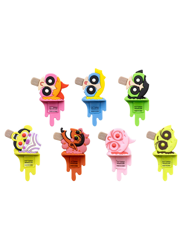 Seven colorful, novelty ice pop-shaped items arranged on a plain white background. Each has a different bright color scheme with cartoonish eyes and melting-edge shapes.