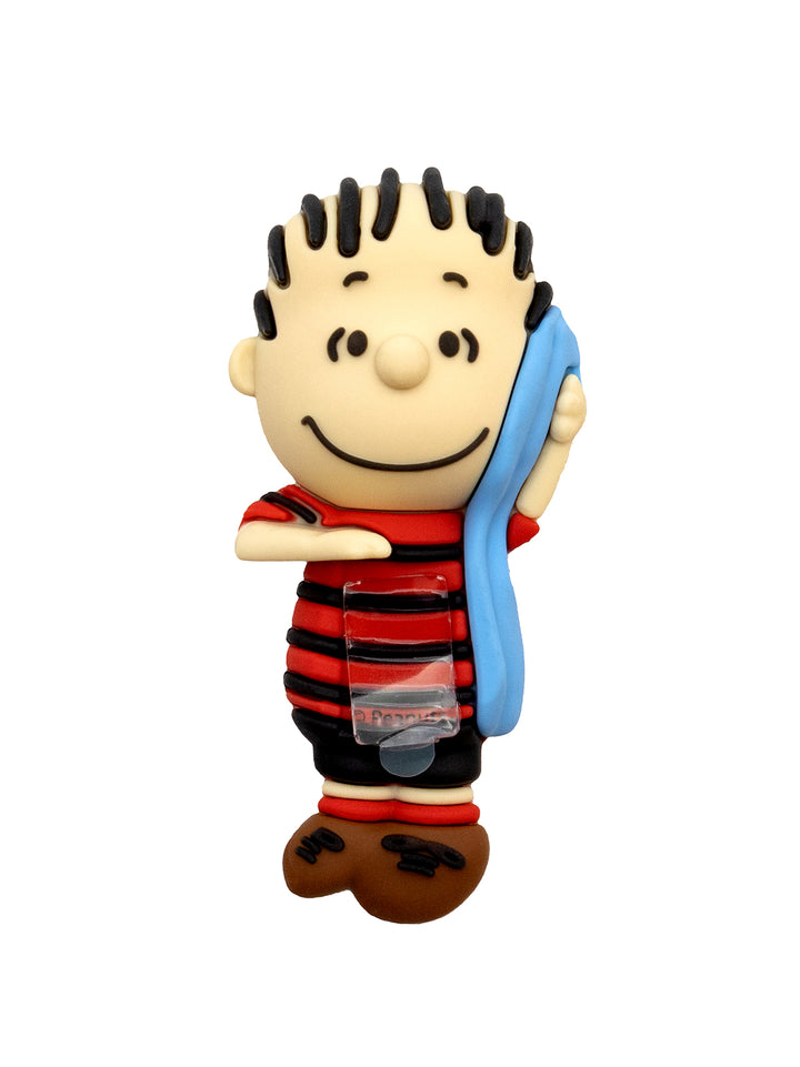 A figurine of Linus from the Peanuts comic strip series, wearing his signature red and black striped shirt, black shorts, and brown shoes, holding a blue blanket. 