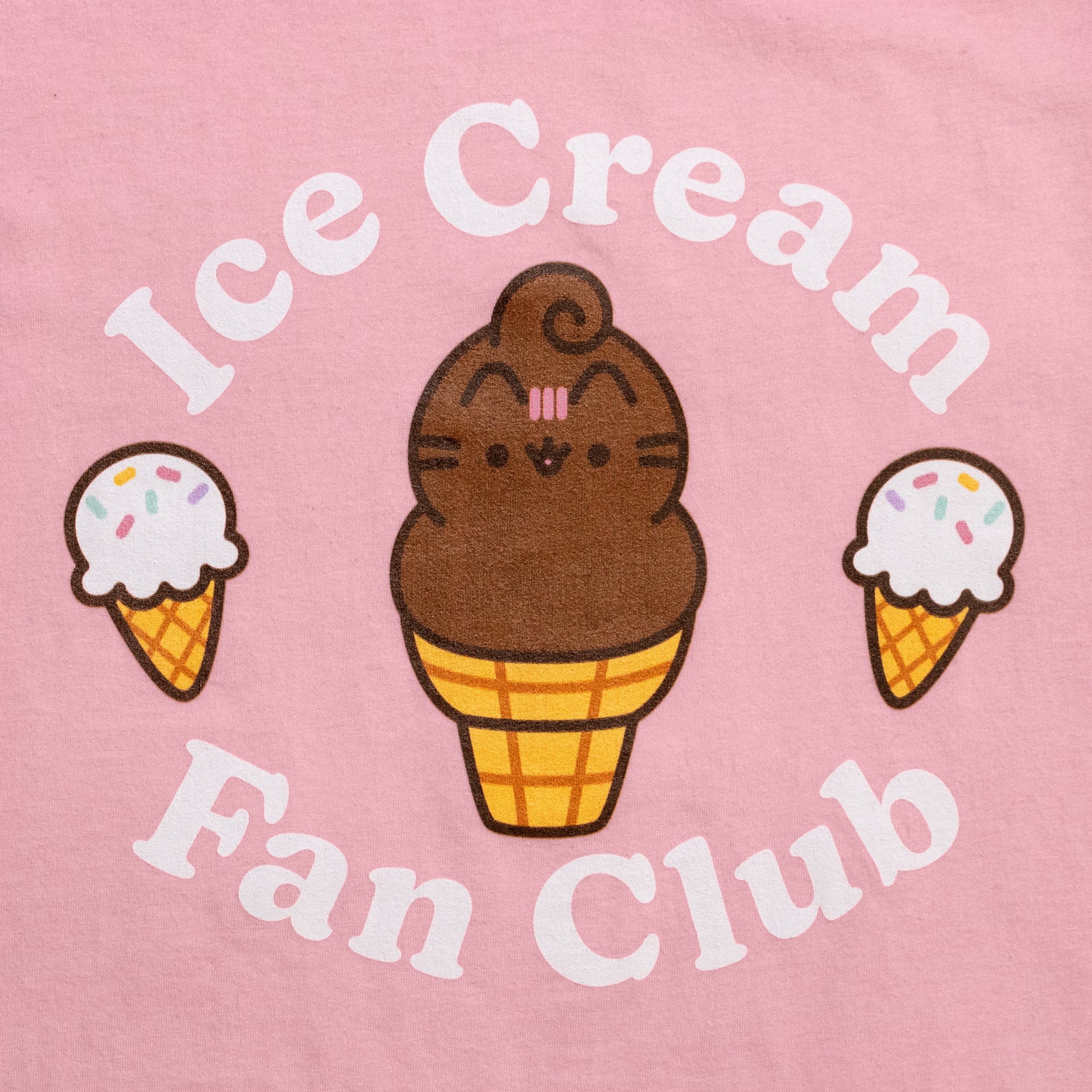image on shirt: chocolate pusheen ice cream cone in the middle and 2 vanilla ice cream cones with sprinkles on left and right sides. text: ice cream fan club
