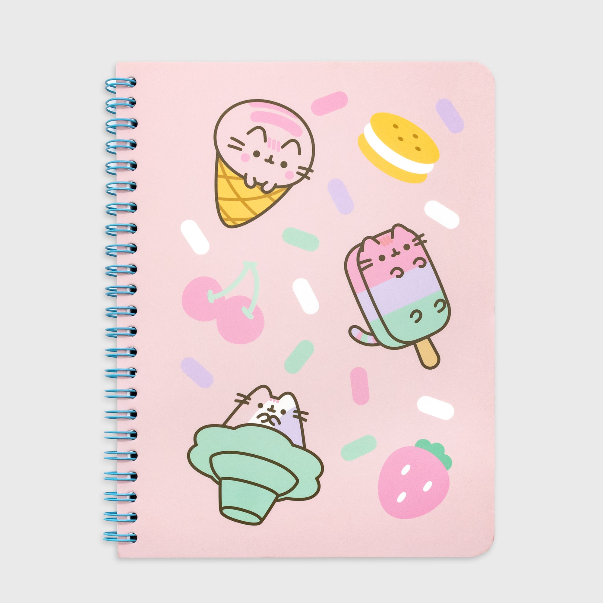 pusheen notebook. image on cover: pusheen as ice cream cone, pusheen as ice pop, pusheen as sundea. cookie ice cream sandwich, cherry, strawberry. sprinkles. spiral bound.