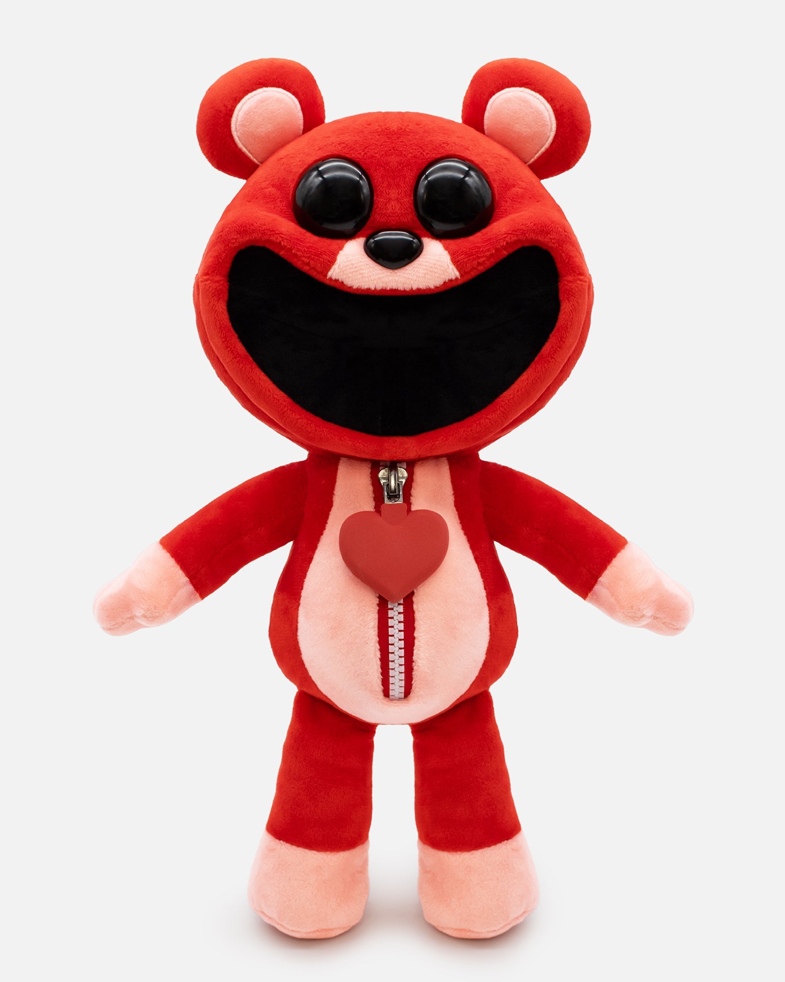 bobby bearhug plush standing facing forward. heart shaped pendant.