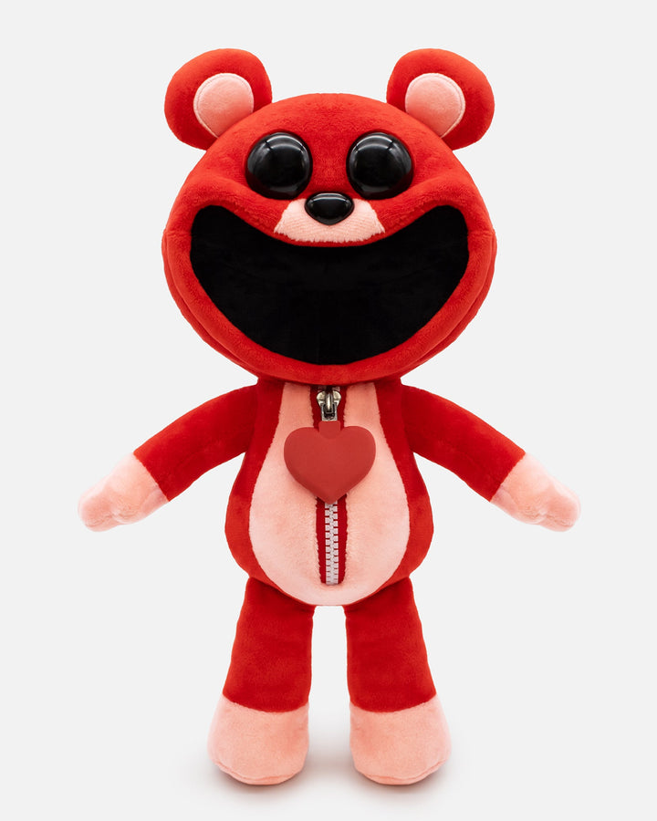 bobby bearhug plush standing facing forward. heart shaped pendant.