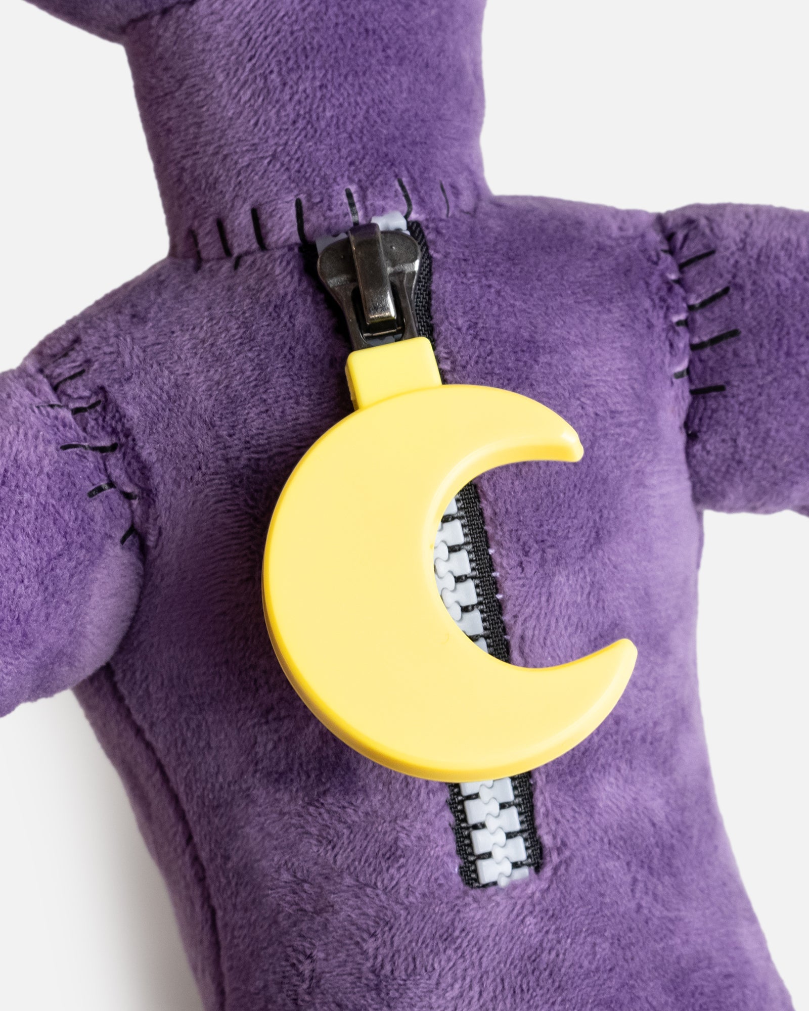 monster catnap plush close up of stitches and zipper