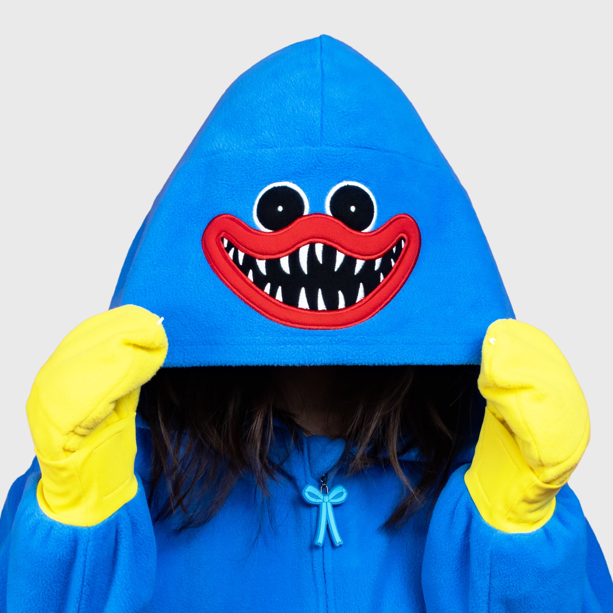 close up of hood on onesie. scary huggy wuggy smile.