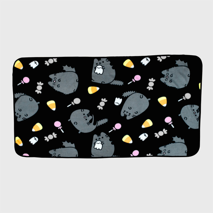 scaredy cat pusheen throw blanket. repeating pattern of scaredy pusheen, ghost, candy corn, candy, lollipop