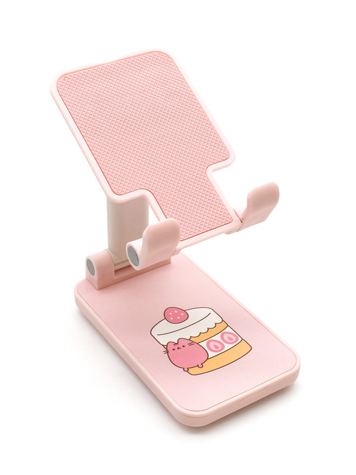 Pink phone holder with a cartoon design on a white background