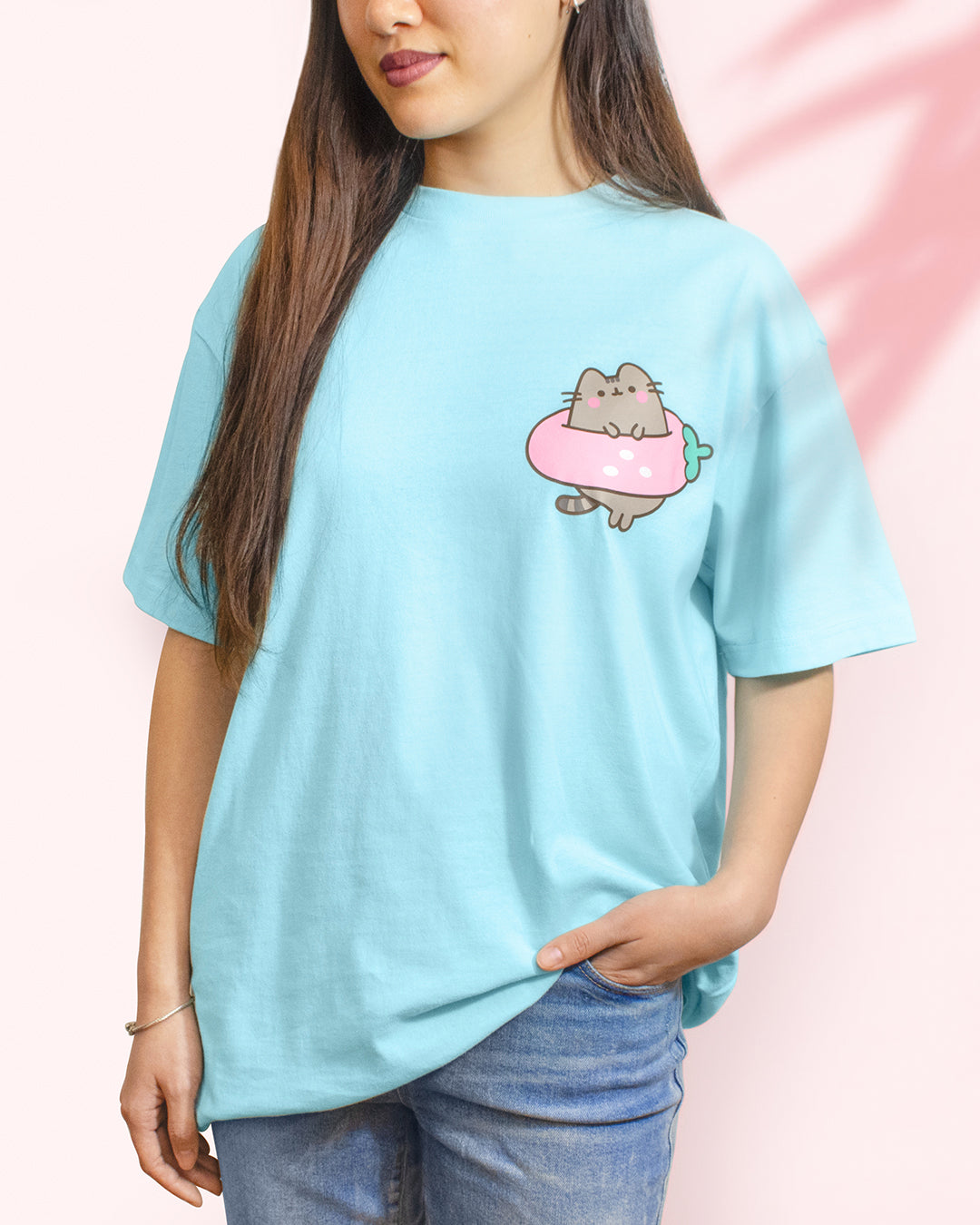 pusheen box shirt front. pusheen in strawberry looking pool float