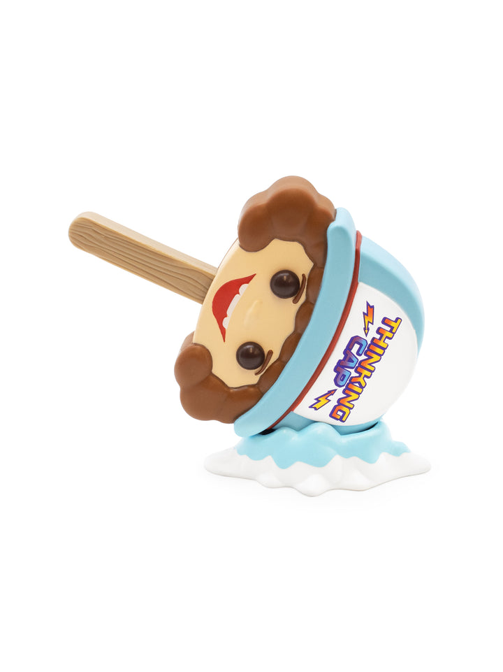 Toy resembling a ice cream cone with a face on a white background