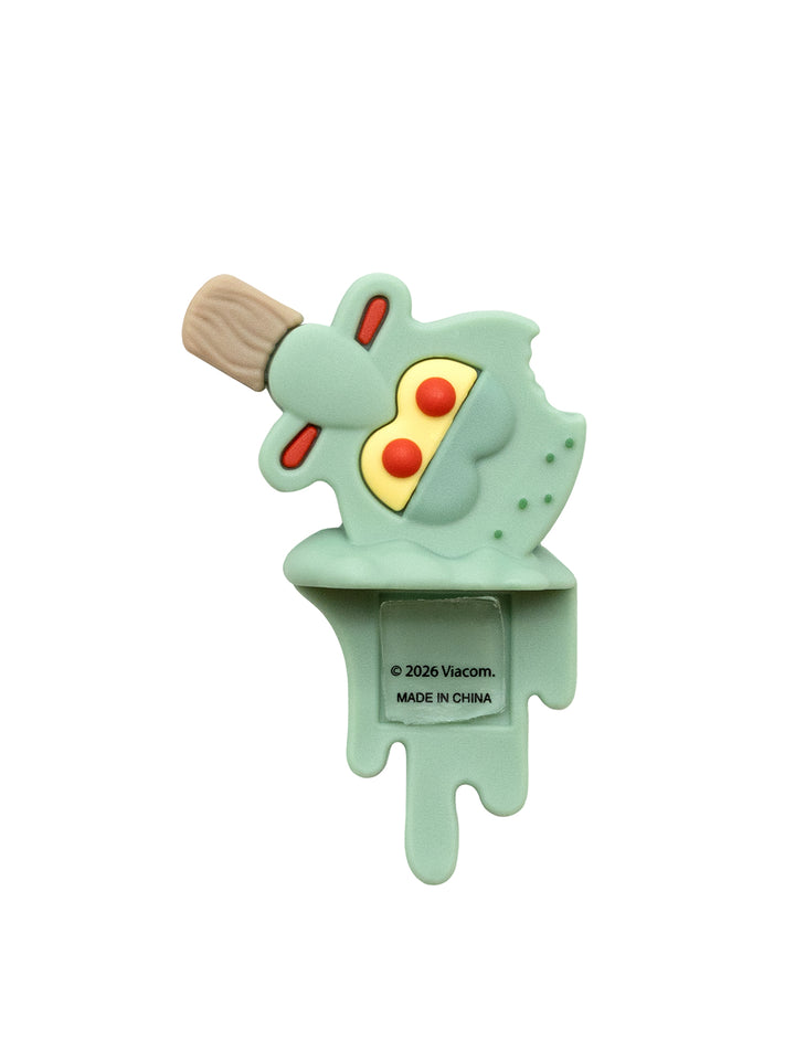 A light green character-shaped popsicle with a beige stick, shown on a plain white background.