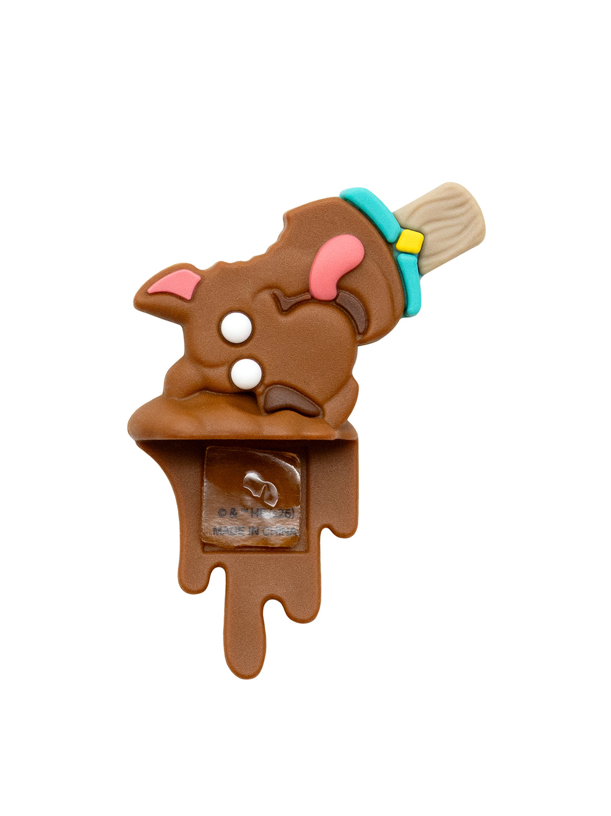 A figure shaped like a melting ice cream cone, featuring a brown body with pink ears, white eyes, a turquoise band, and a beige wooden-look handle, set against a plain white background.