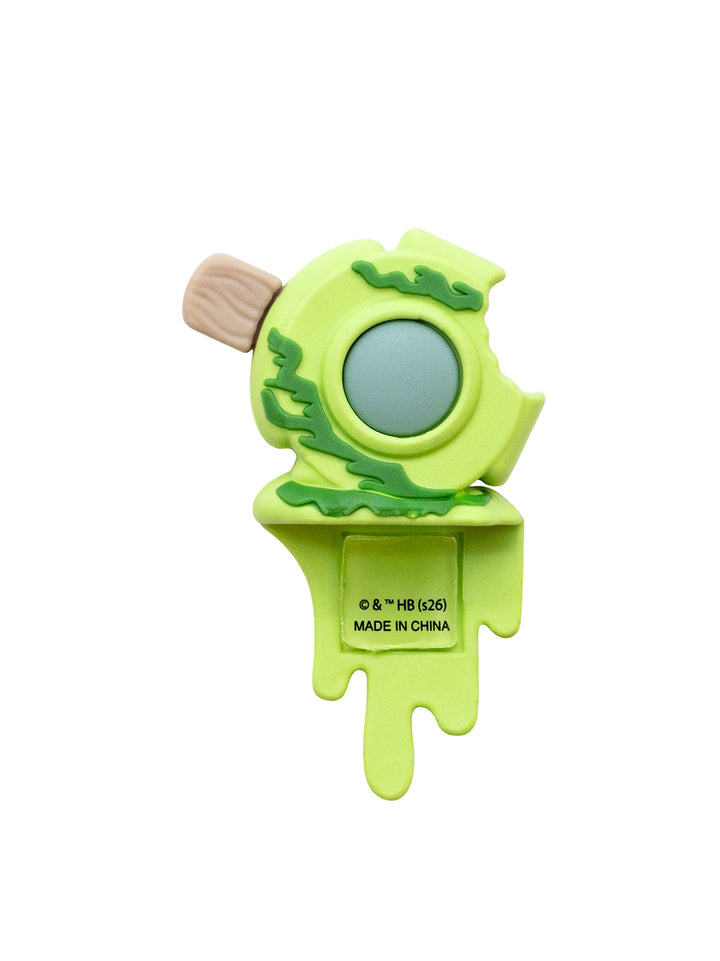 A figure shaped ice cream with a light green body, darker green dripping details, a pale blue circular top section, and a small beige wooden cone on the left.