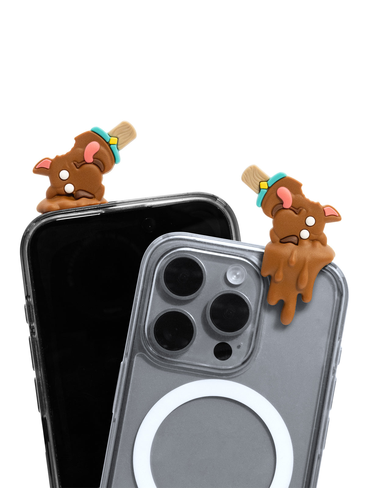 A clear MagSafe-compatible phone case shown on a smartphone, with two small brown cartoon character charms attached near the top corners of the case, photographed on a white background.