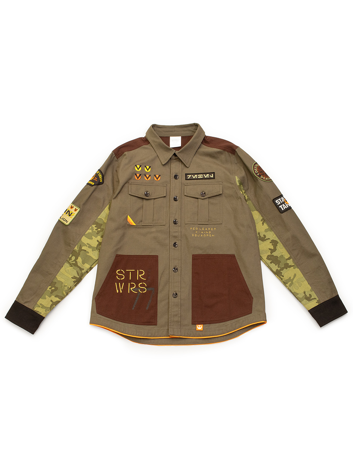 Brown military-style shirt with patches and text on a white background