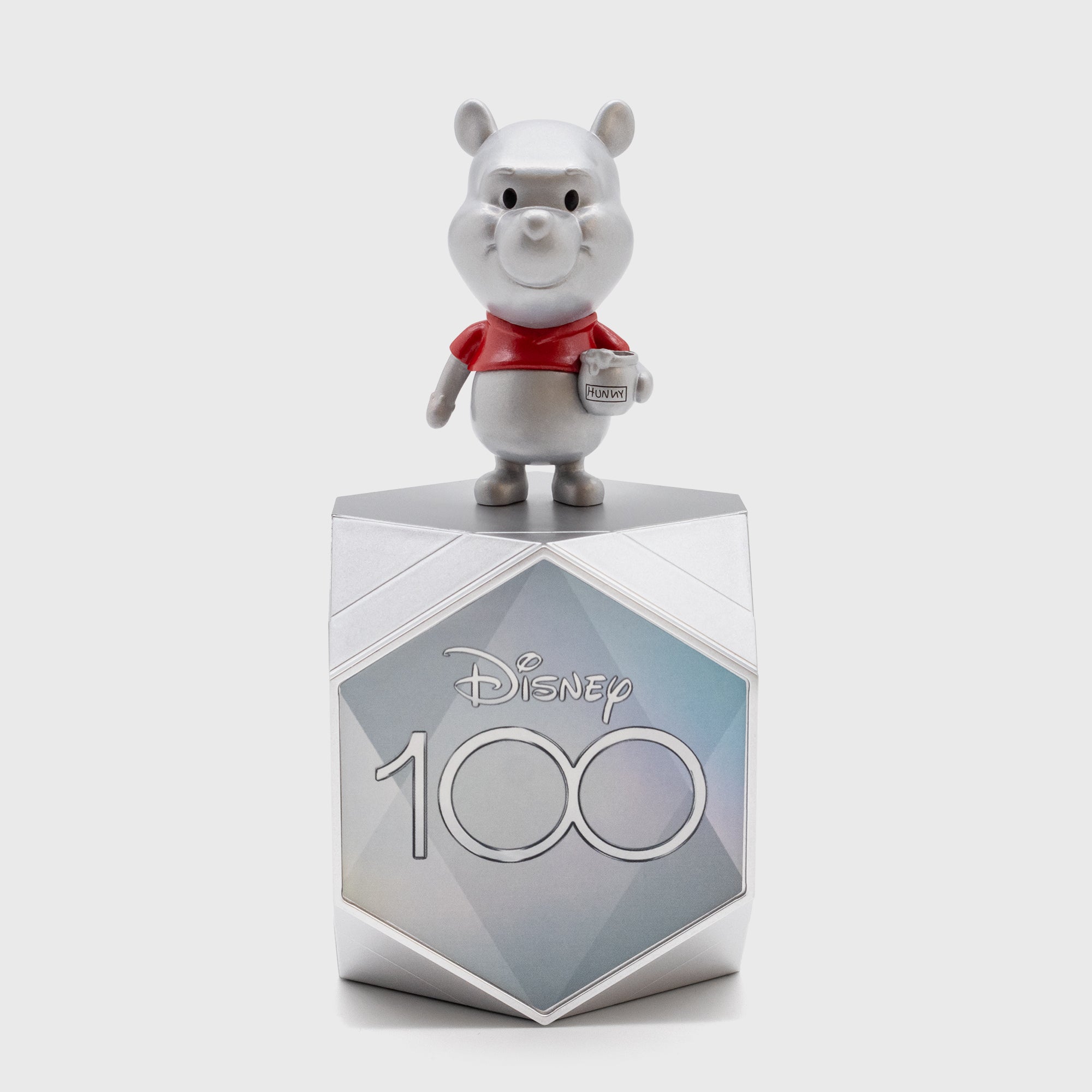 winnie the pooh on top of disney100 box