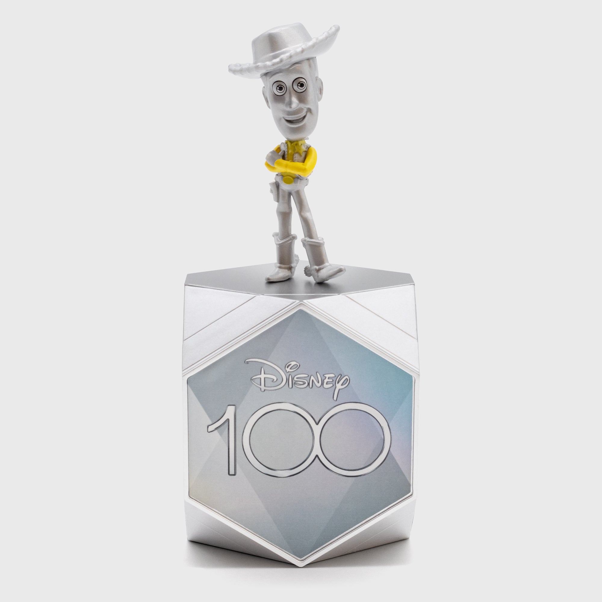 woody on top of disney100 box