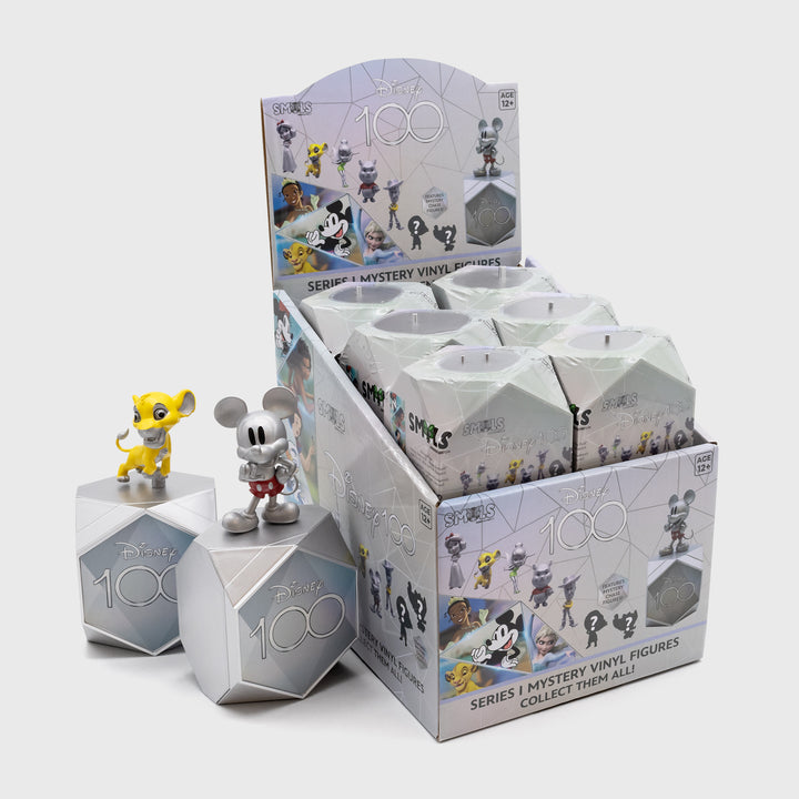full pdq with simba and mickey mouse in front. text on pdq: disney100 smols, features mystery chase figures! series 1 mystery vinyl figures collect them all!