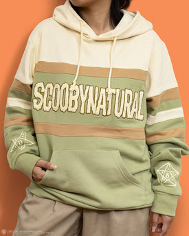 model wearing hoodie with scoobynatural on front