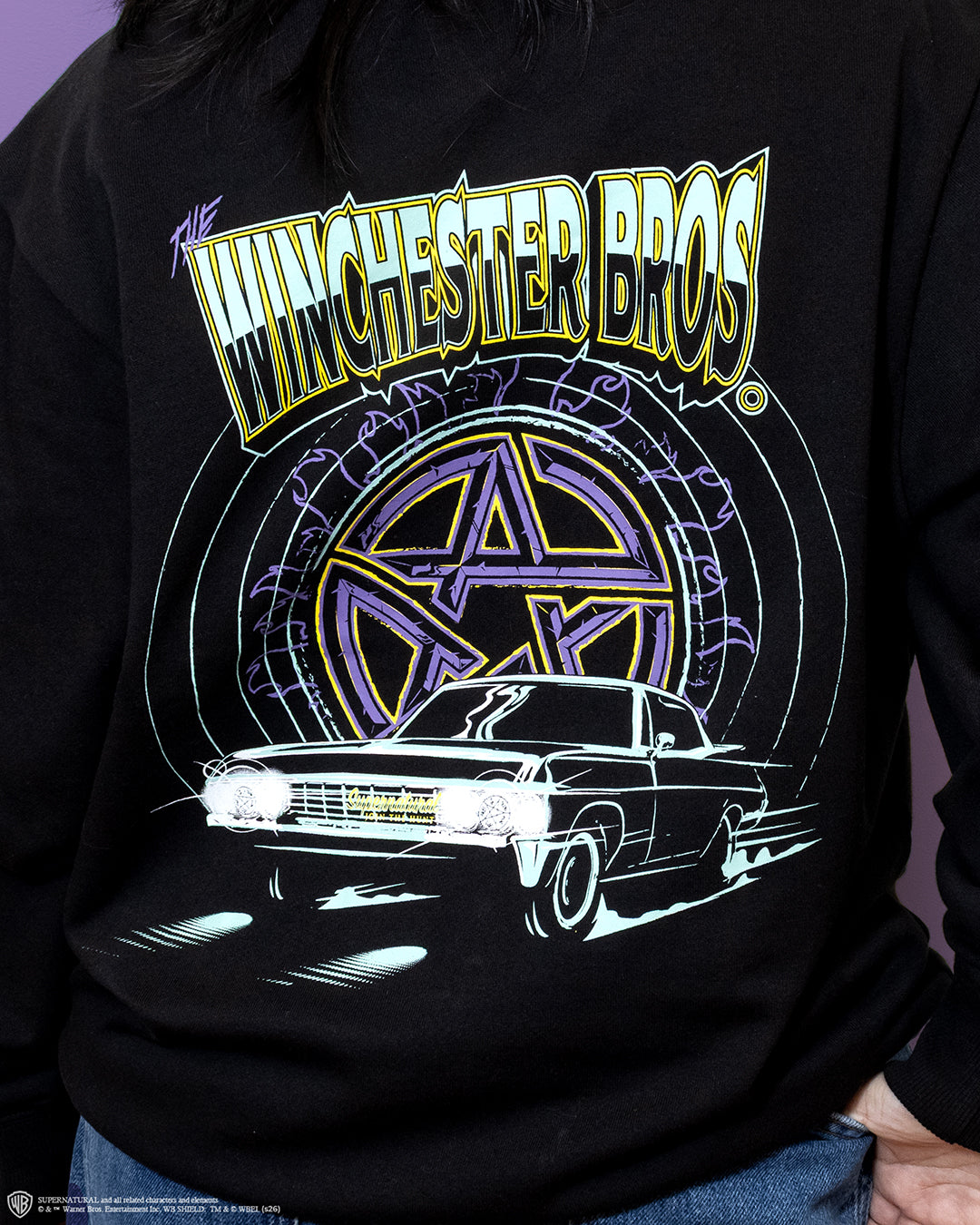 q1 2026 supernatural box crewneck sweater back. image: supernatural symbol with impala. text: the winchester bros. 