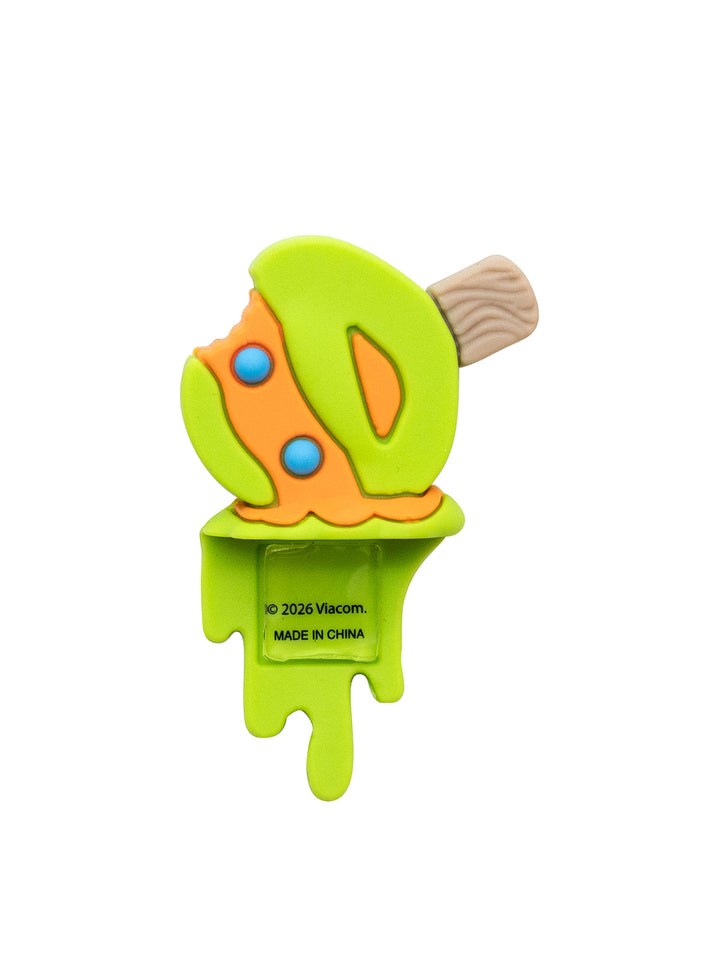 A novelty silicone product shaped like a melting lime-green popsicle with orange mask, blue eyes, and a wood-grain handle, shown on a plain white background.