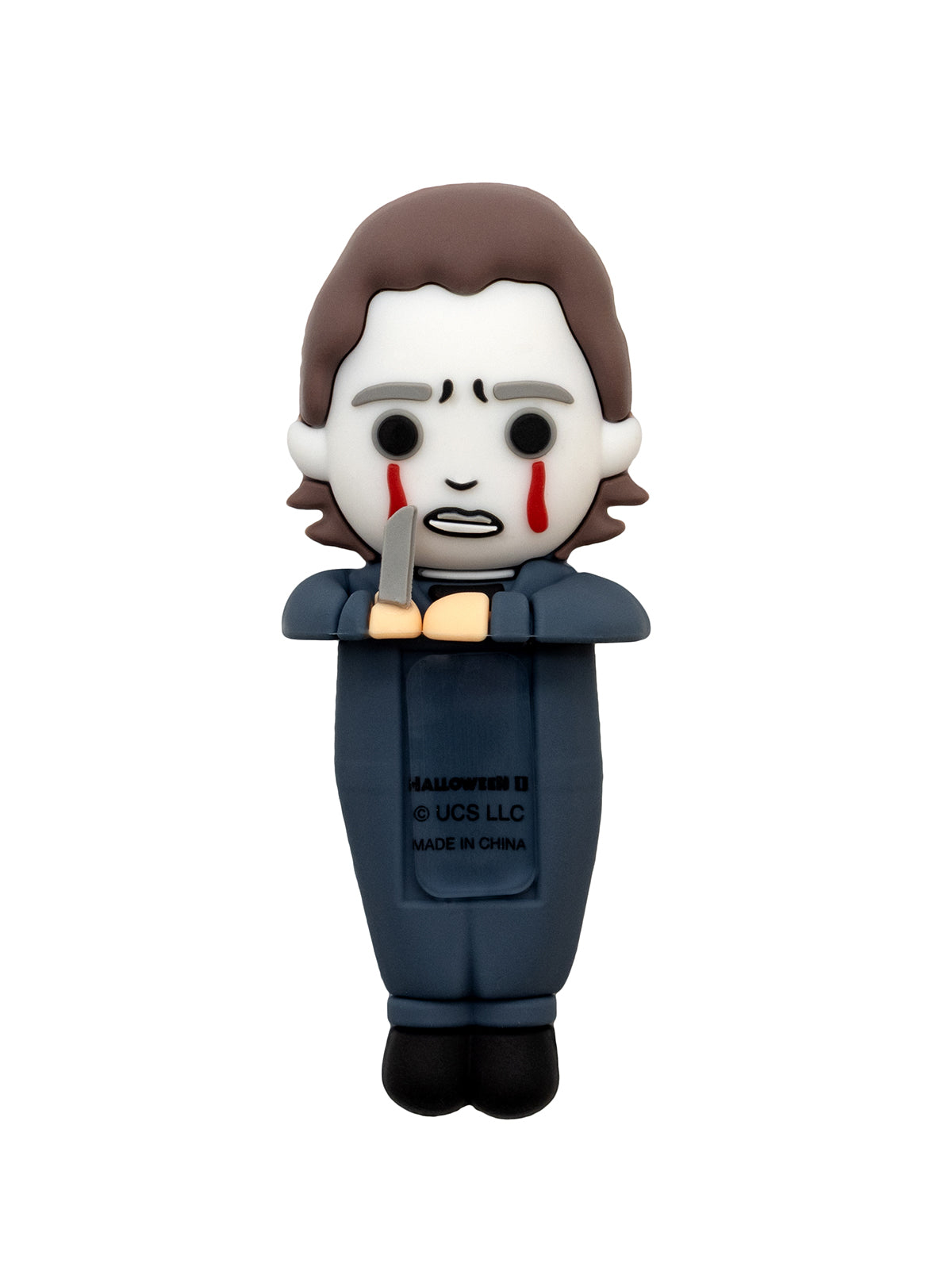 Toy figure of a character with a knife on a white background