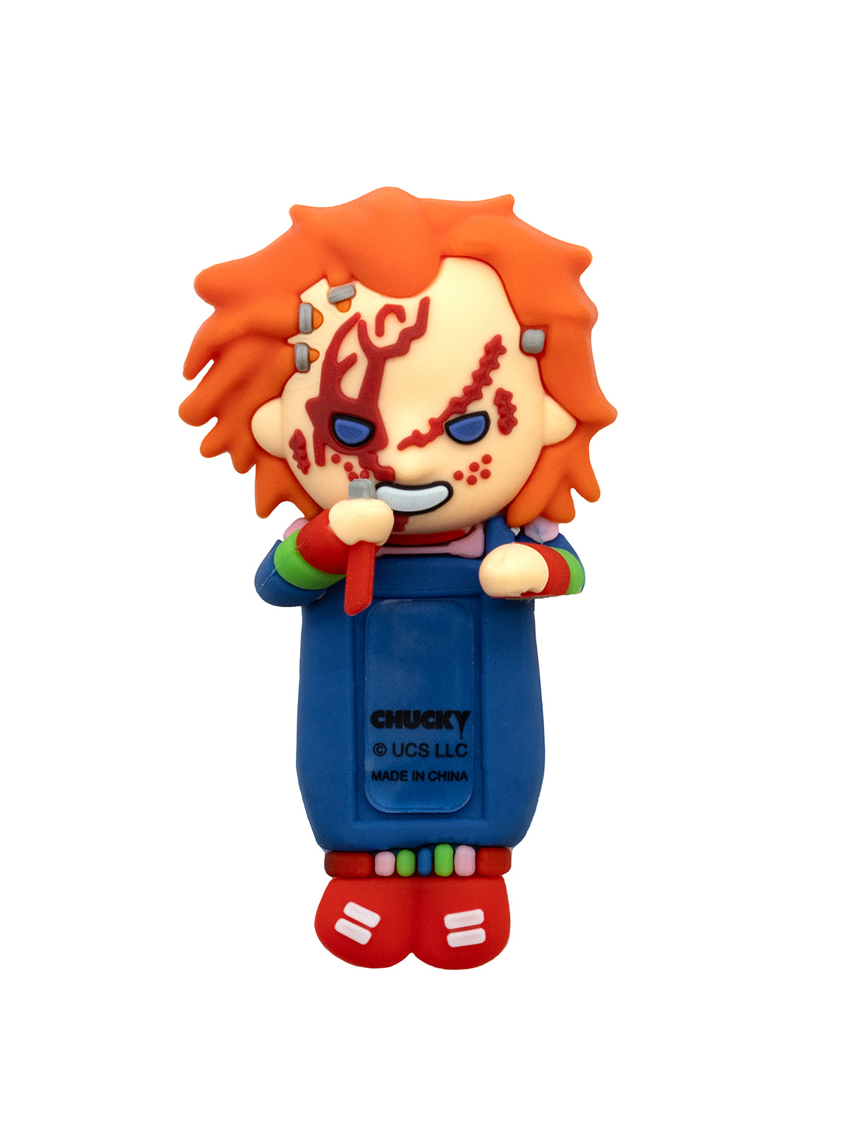 Toy figure with red hair and blue eyes on a white background