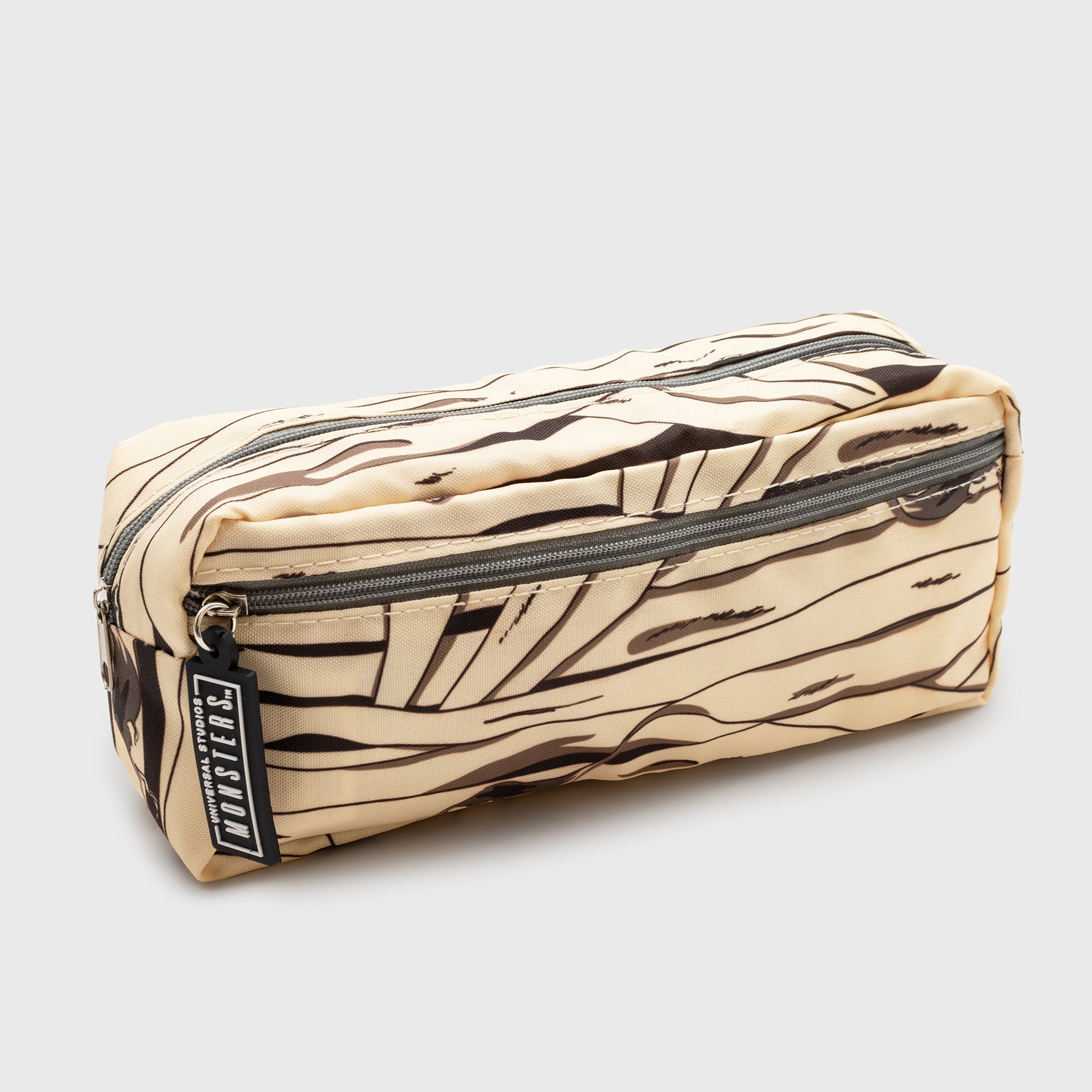 the mummy pencil case. mummy wrapping design. text on zipper: universal studios monster