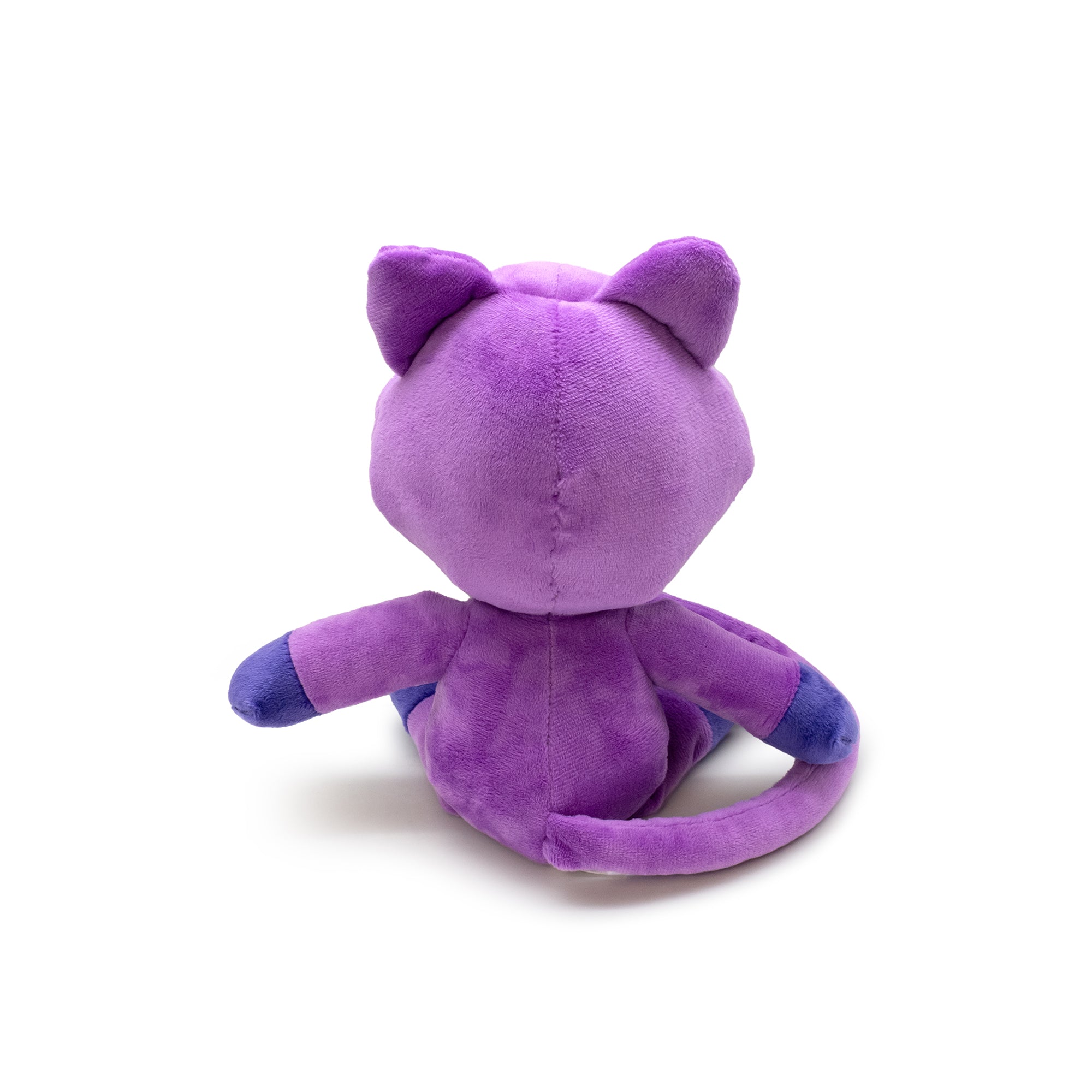 Purple plush toy with cat-like features on a white background